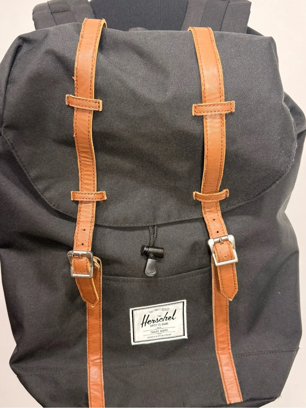Hershel Retreat Backpack in Black Brown Saddle Canvas with Interior Red Stripe